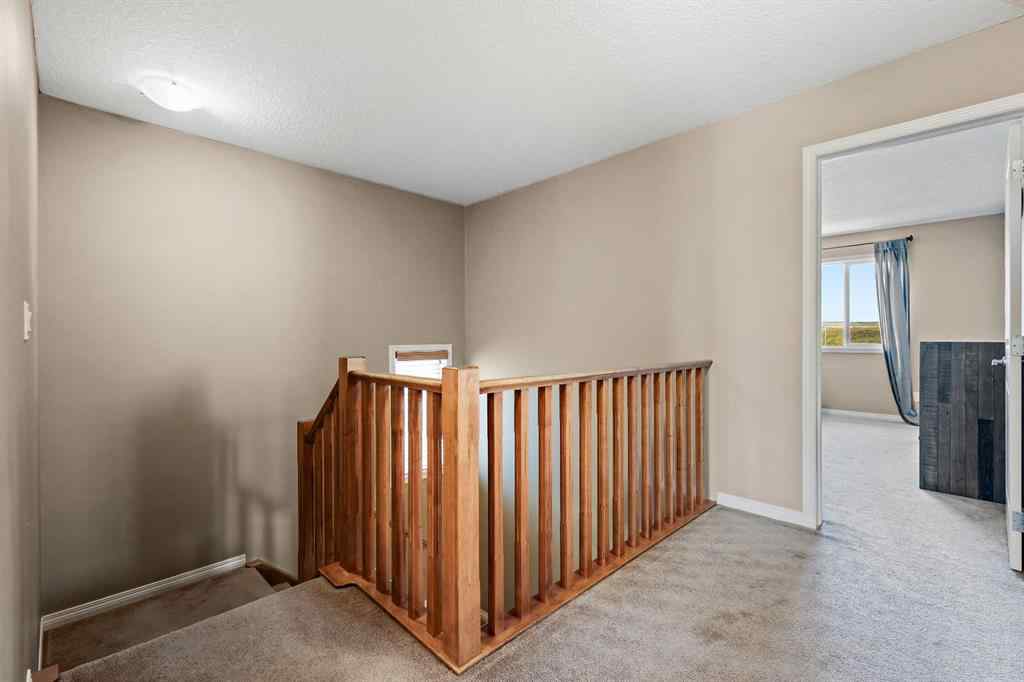 MLS® A2259228 - 114 Everglen Crescent SW in Evergreen Calgary, Residential