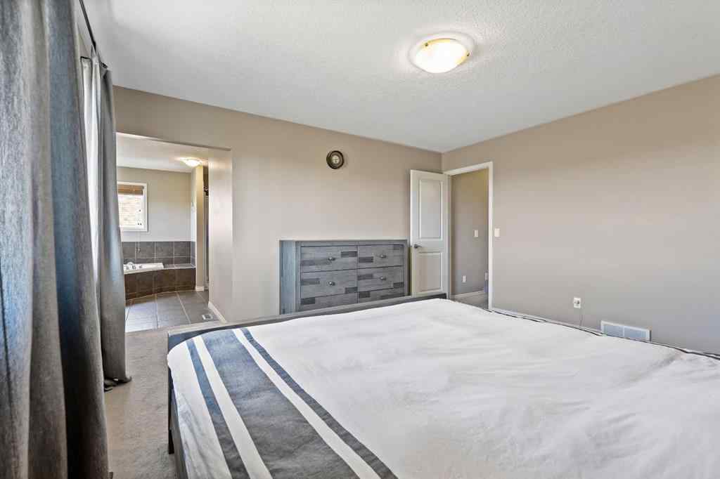 MLS® A2259228 - 114 Everglen Crescent SW in Evergreen Calgary, Residential