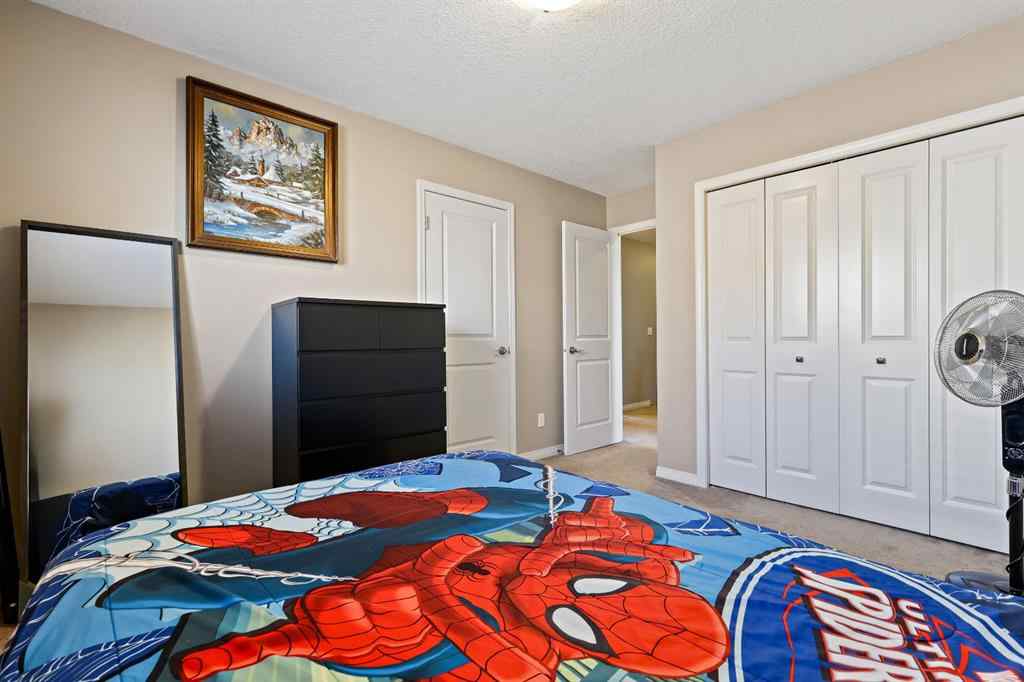 MLS® A2259228 - 114 Everglen Crescent SW in Evergreen Calgary, Residential