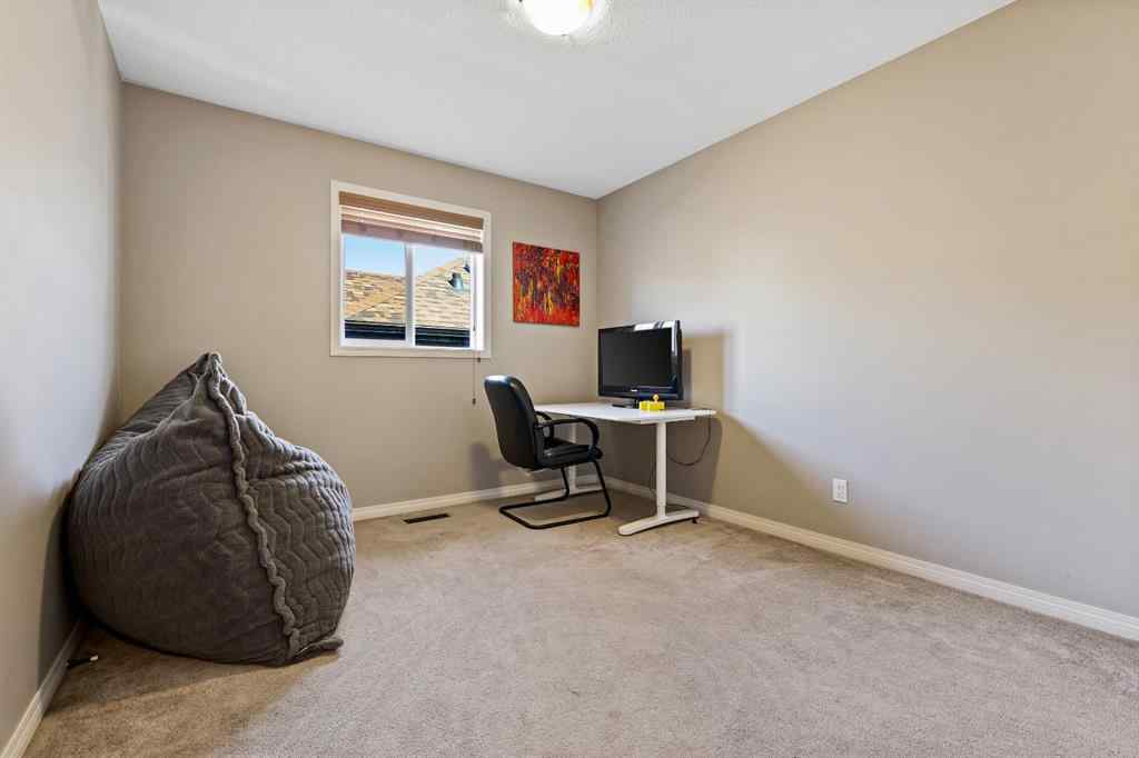 MLS® A2259228 - 114 Everglen Crescent SW in Evergreen Calgary, Residential