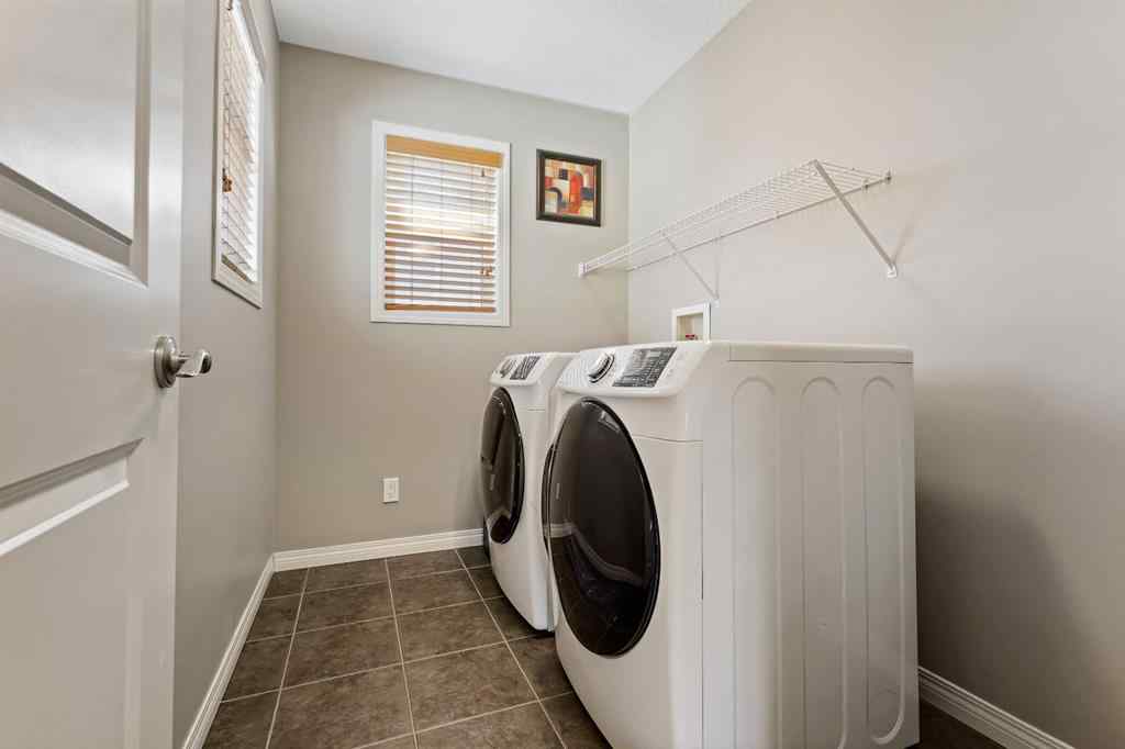 MLS® A2259228 - 114 Everglen Crescent SW in Evergreen Calgary, Residential