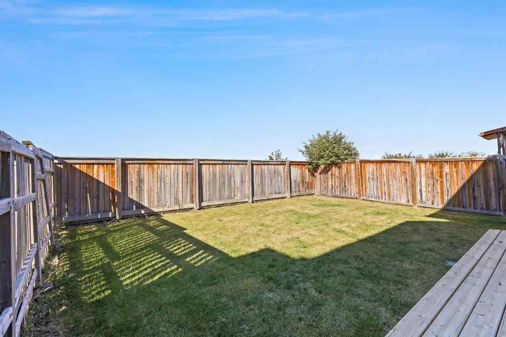 MLS® A2259228 - 114 Everglen Crescent SW in Evergreen Calgary, Residential