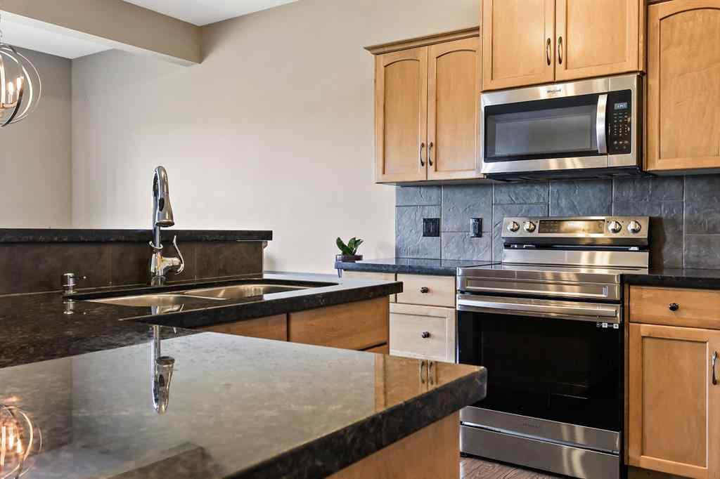 MLS® A2259228 - 114 Everglen Crescent SW in Evergreen Calgary, Residential