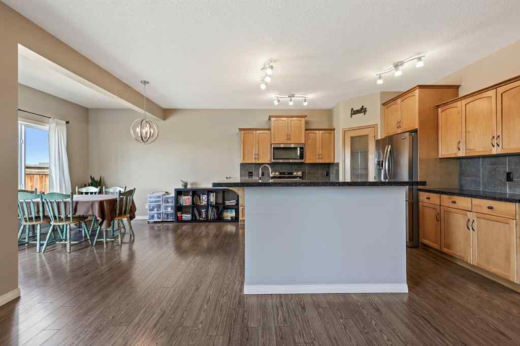 MLS® A2259228 - 114 Everglen Crescent SW in Evergreen Calgary, Residential