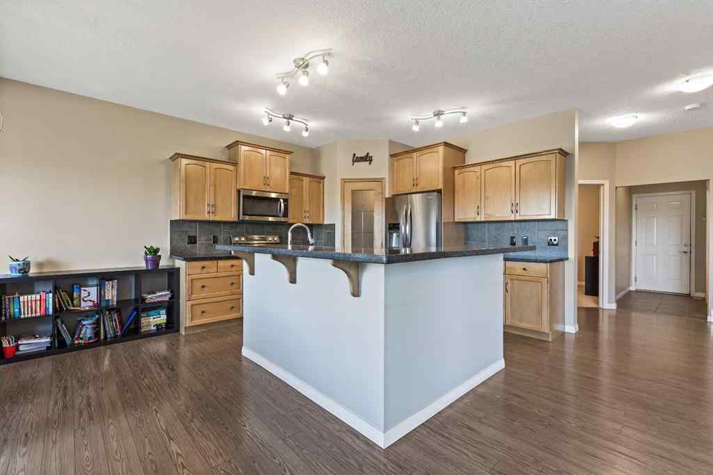 MLS® A2259228 - 114 Everglen Crescent SW in Evergreen Calgary, Residential