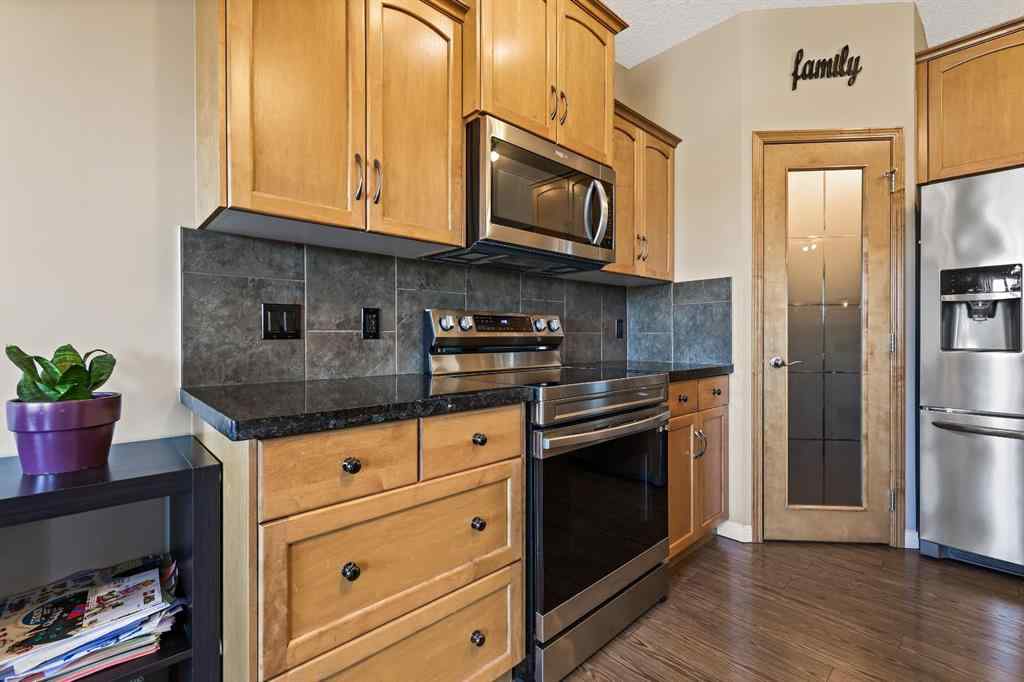 MLS® A2259228 - 114 Everglen Crescent SW in Evergreen Calgary, Residential