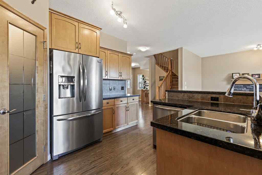 MLS® A2259228 - 114 Everglen Crescent SW in Evergreen Calgary, Residential
