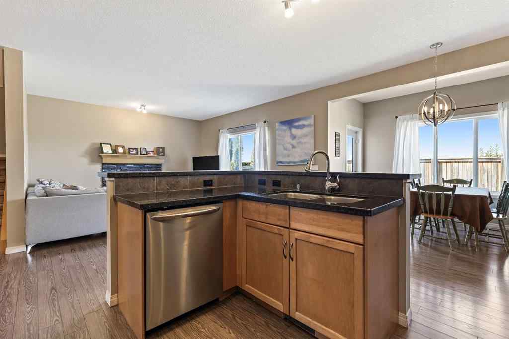 MLS® A2259228 - 114 Everglen Crescent SW in Evergreen Calgary, Residential