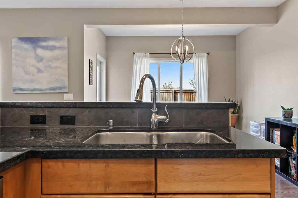 MLS® A2259228 - 114 Everglen Crescent SW in Evergreen Calgary, Residential