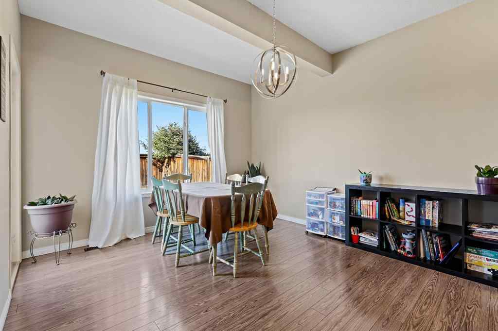 MLS® A2259228 - 114 Everglen Crescent SW in Evergreen Calgary, Residential