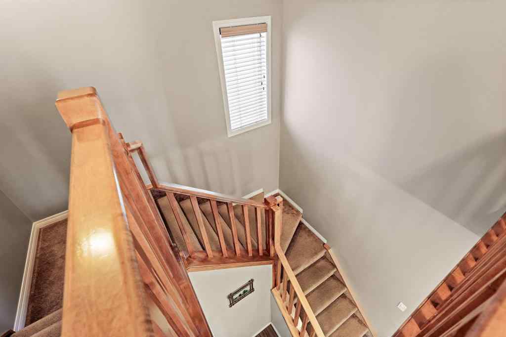 MLS® A2259228 - 114 Everglen Crescent SW in Evergreen Calgary, Residential