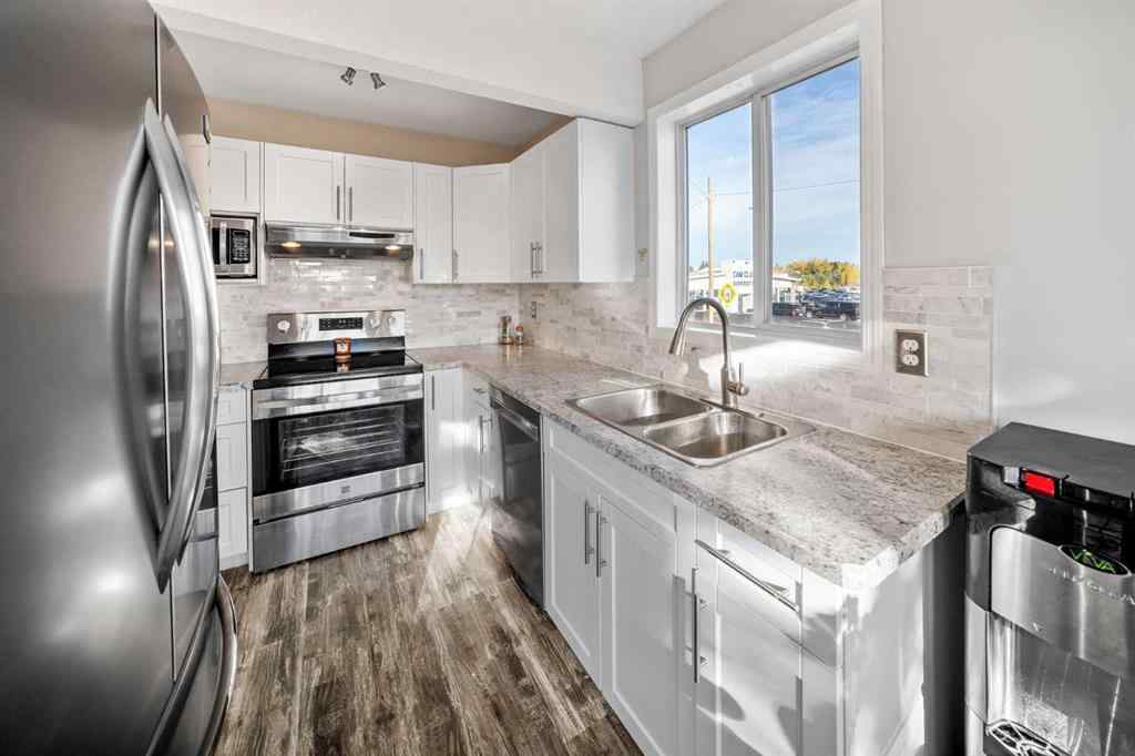 MLS® A2259262 - Unit #12 567 Edmonton Trail NE in Edmonton Trail Airdrie, Residential