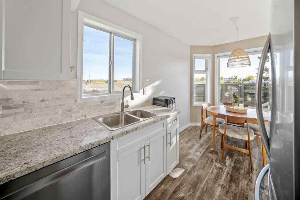 MLS® A2259262 - Unit #12 567 Edmonton Trail NE in Edmonton Trail Airdrie, Residential