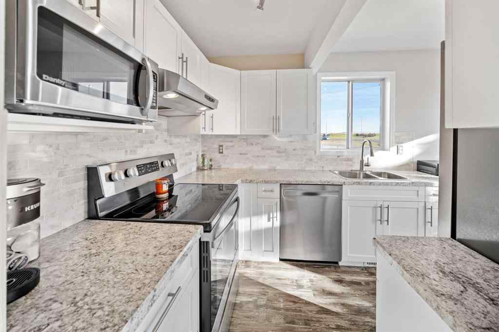 MLS® A2259262 - Unit #12 567 Edmonton Trail NE in Edmonton Trail Airdrie, Residential