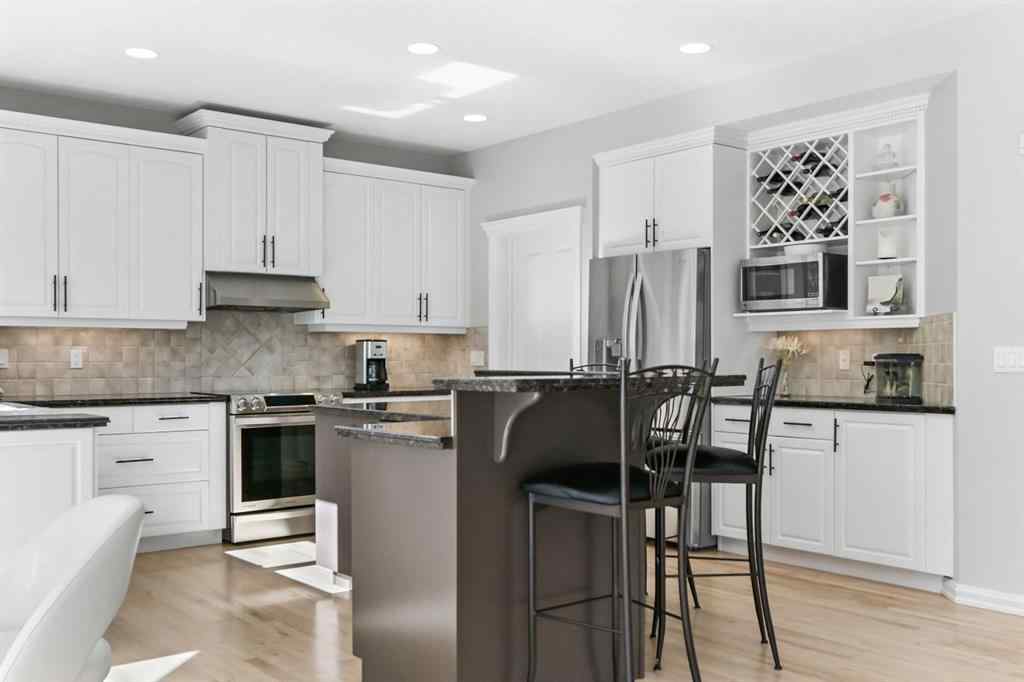 MLS® A2259269 - 1458 Strathcona Drive SW in Strathcona Park Calgary, Residential