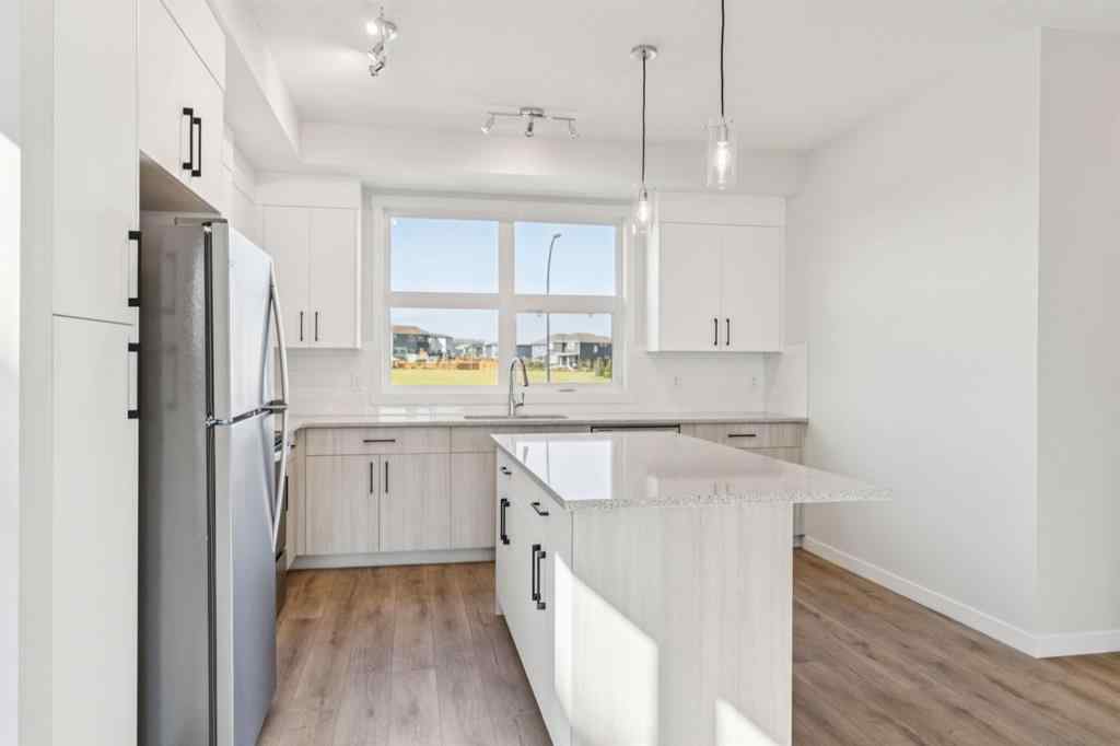 MLS® A2259286 - Unit #110 400 Belmont Street SW in Belmont Calgary, Residential