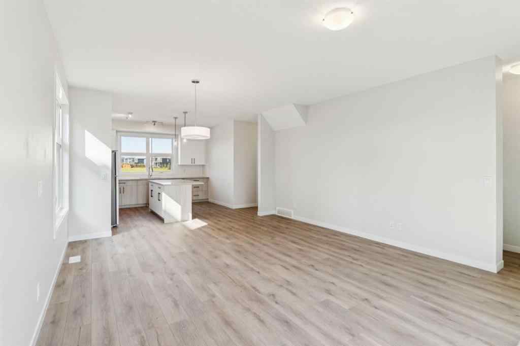 MLS® A2259286 - Unit #110 400 Belmont Street SW in Belmont Calgary, Residential