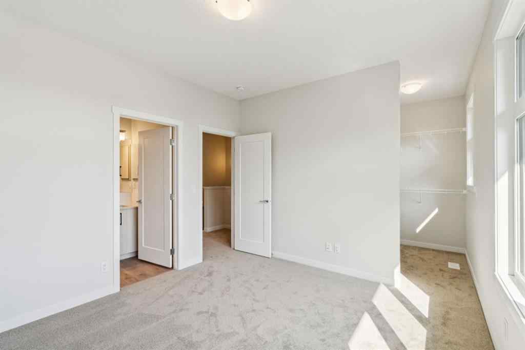MLS® A2259286 - Unit #110 400 Belmont Street SW in Belmont Calgary, Residential