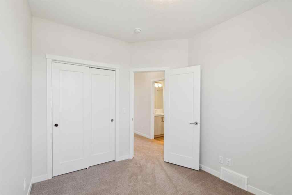 MLS® A2259286 - Unit #110 400 Belmont Street SW in Belmont Calgary, Residential