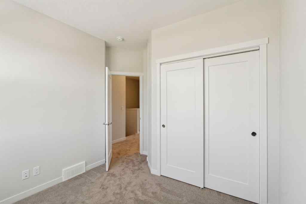 MLS® A2259286 - Unit #110 400 Belmont Street SW in Belmont Calgary, Residential