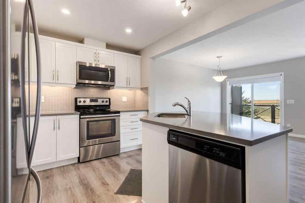 MLS® A2259294 - 157 Hillcrest Square SW in Hillcrest Airdrie, Residential