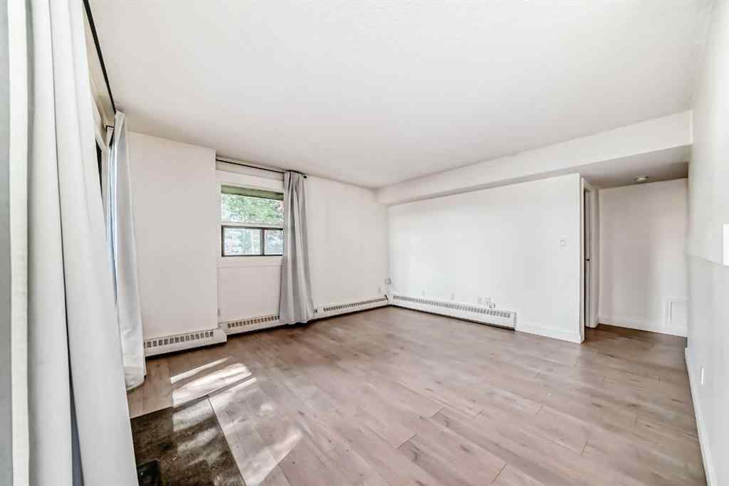 MLS® A2259298 - Unit #102 9800 Horton Road SW in Haysboro Calgary, Residential