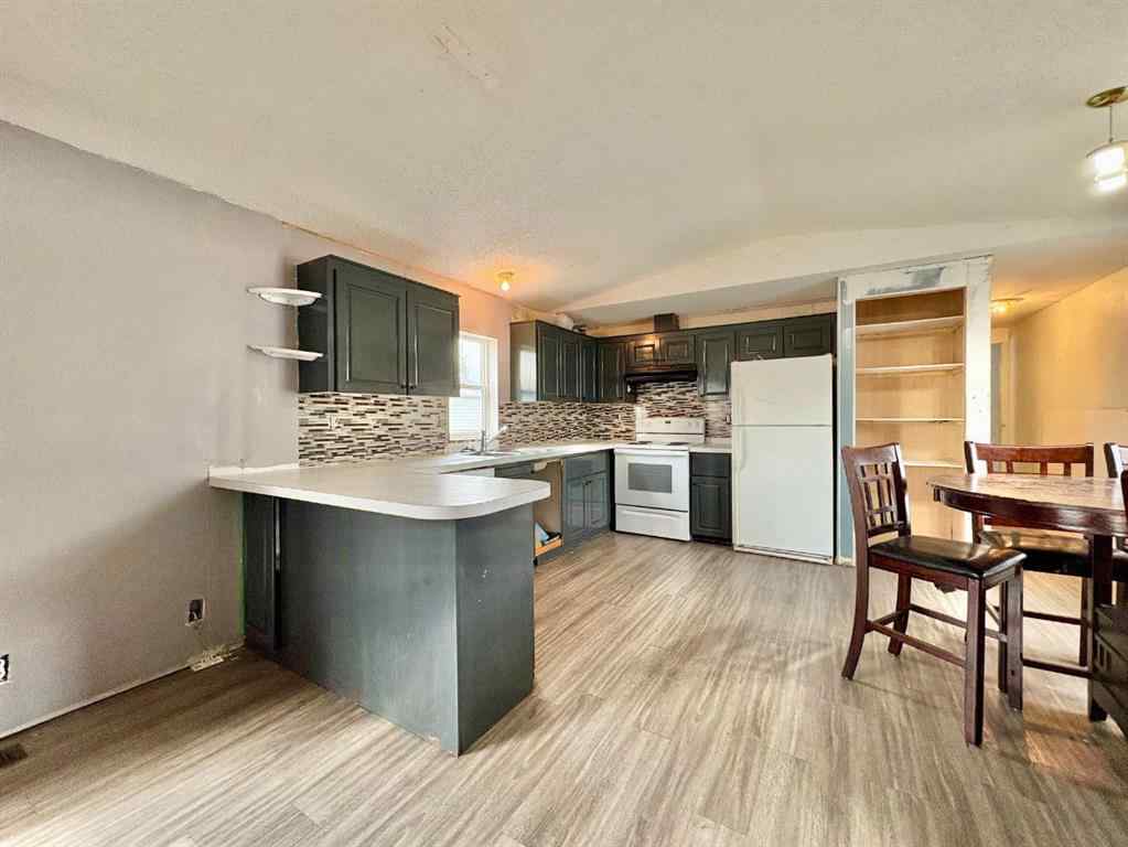 MLS® A2259329 - 9734 121 Avenue  in Crystal Ridge Grande Prairie, Residential
