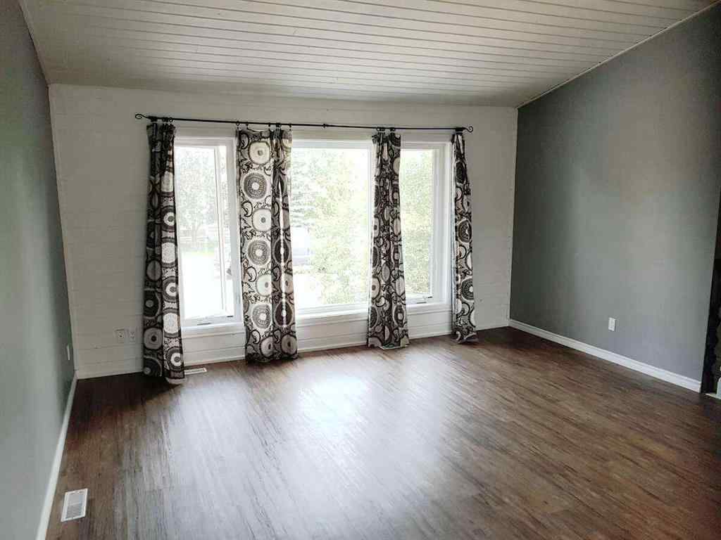 MLS® A2259341 - 9313 71 Avenue  in South Patterson Place Grande Prairie, Residential