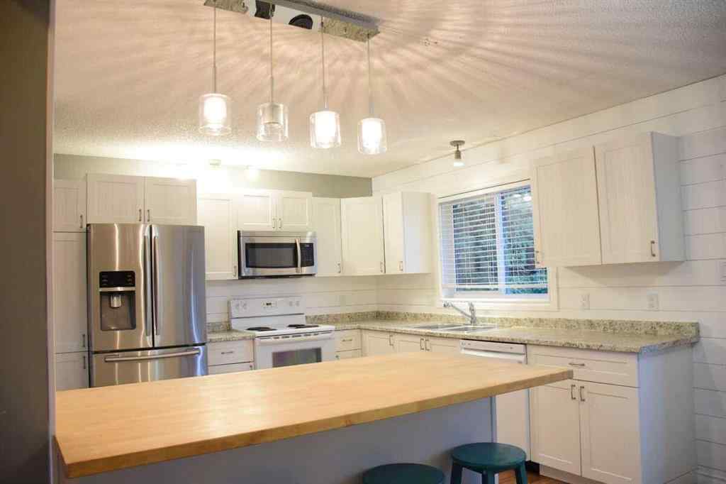 MLS® A2259341 - 9313 71 Avenue  in South Patterson Place Grande Prairie, Residential