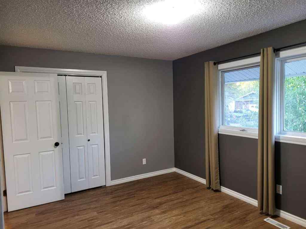 MLS® A2259341 - 9313 71 Avenue  in South Patterson Place Grande Prairie, Residential
