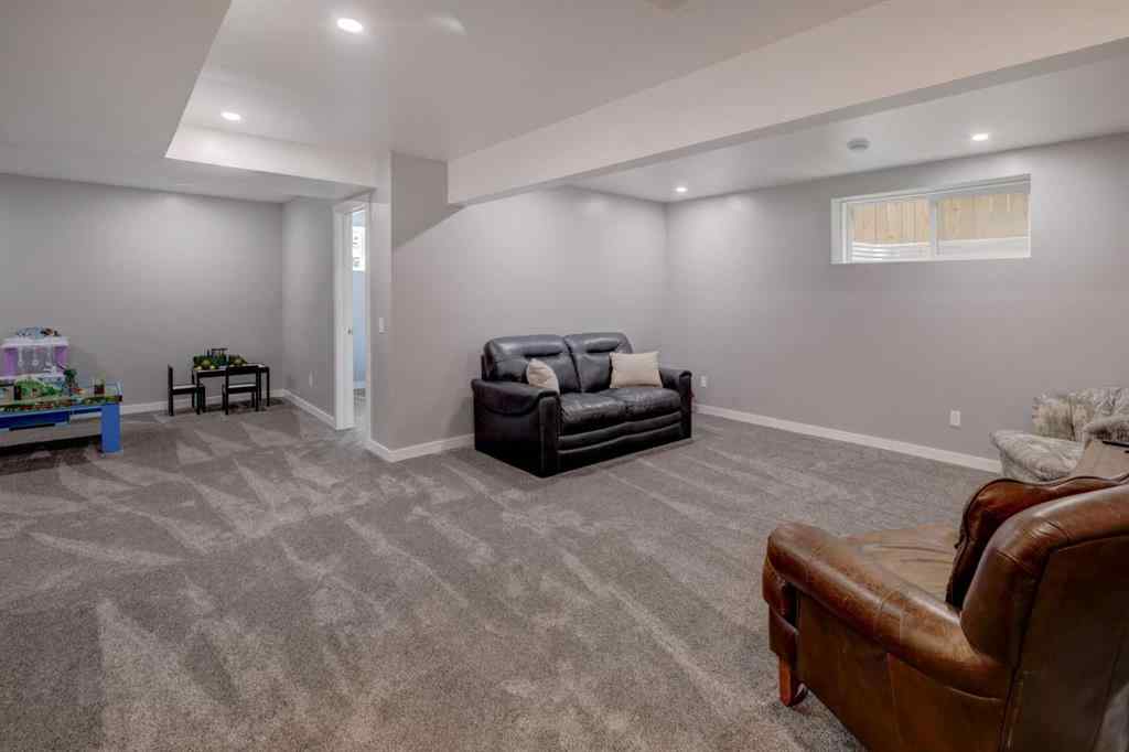 MLS® A2259368 - 487 Rivercrest Road  in Rivercrest Cochrane, Residential