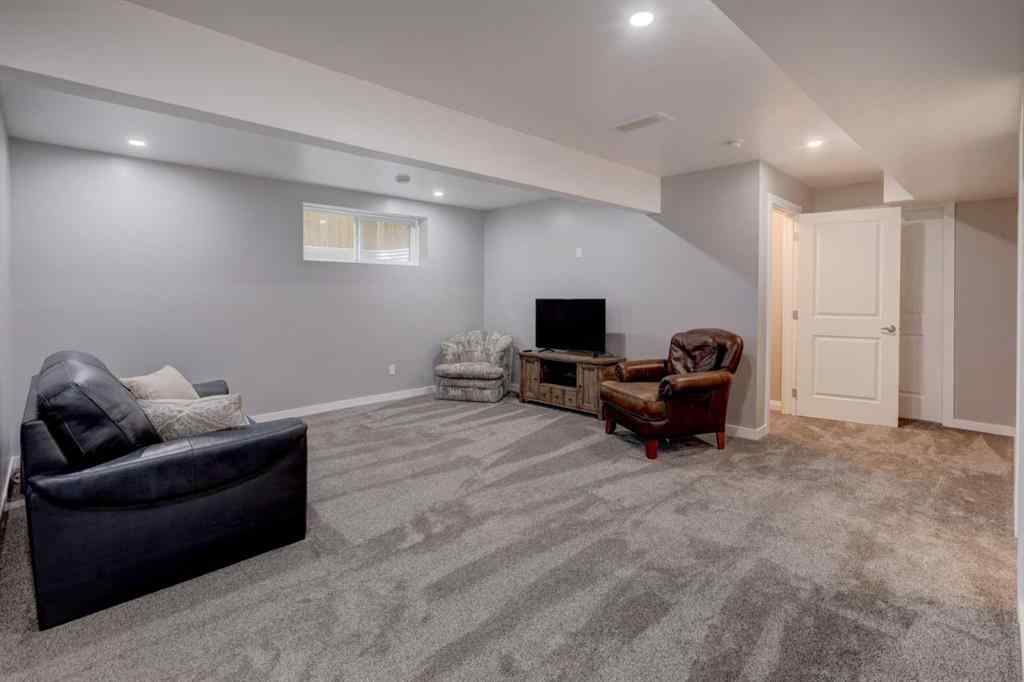 MLS® A2259368 - 487 Rivercrest Road  in Rivercrest Cochrane, Residential