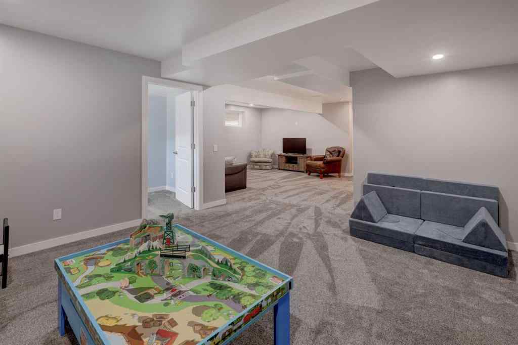 MLS® A2259368 - 487 Rivercrest Road  in Rivercrest Cochrane, Residential