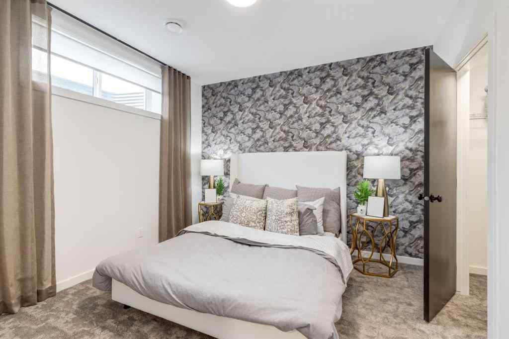 MLS® A2259381 - 560 Walgrove Boulevard SE in Walden Calgary, Residential