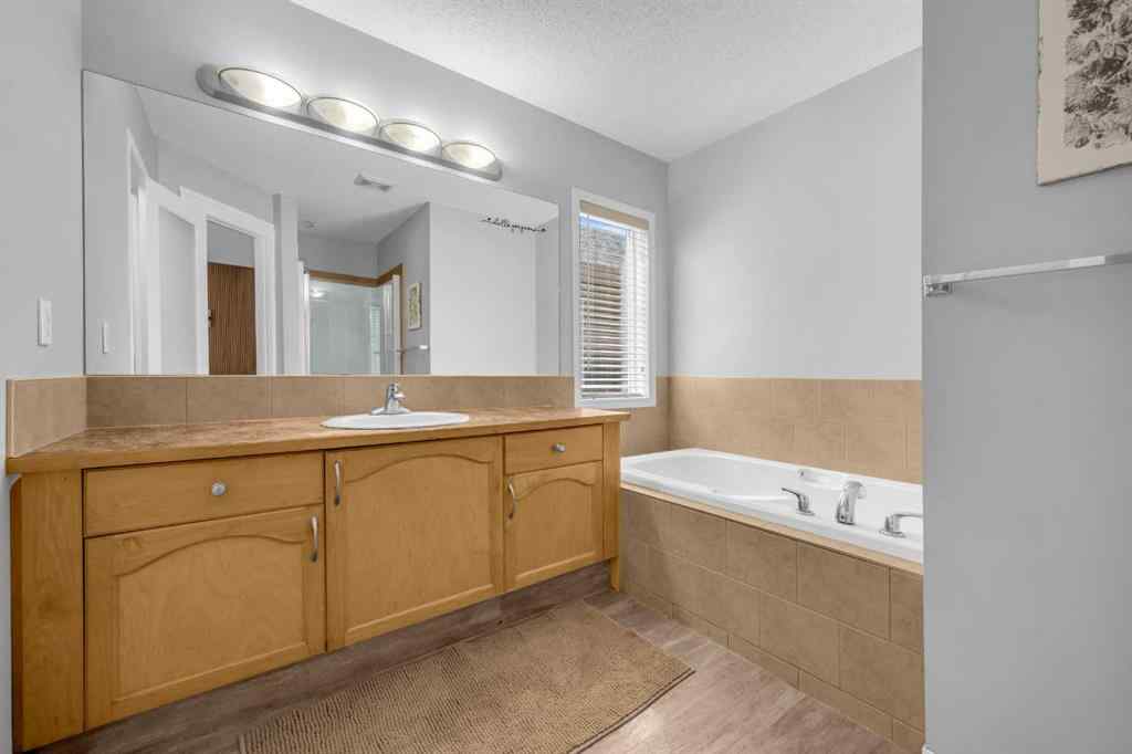 MLS® A2259387 - 233 Saddlecrest Way NE in Saddle Ridge Calgary, Residential