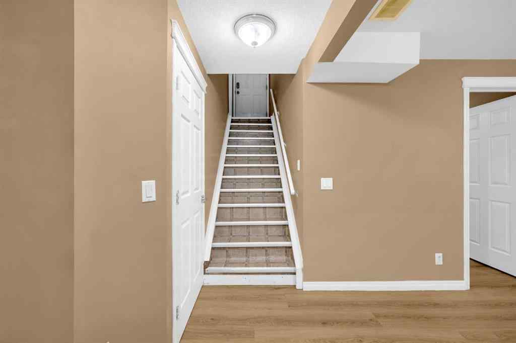 MLS® A2259387 - 233 Saddlecrest Way NE in Saddle Ridge Calgary, Residential