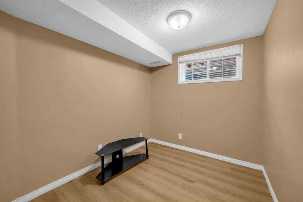 MLS® A2259387 - 233 Saddlecrest Way NE in Saddle Ridge Calgary, Residential