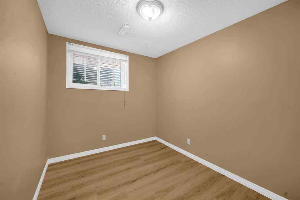 MLS® A2259387 - 233 Saddlecrest Way NE in Saddle Ridge Calgary, Residential