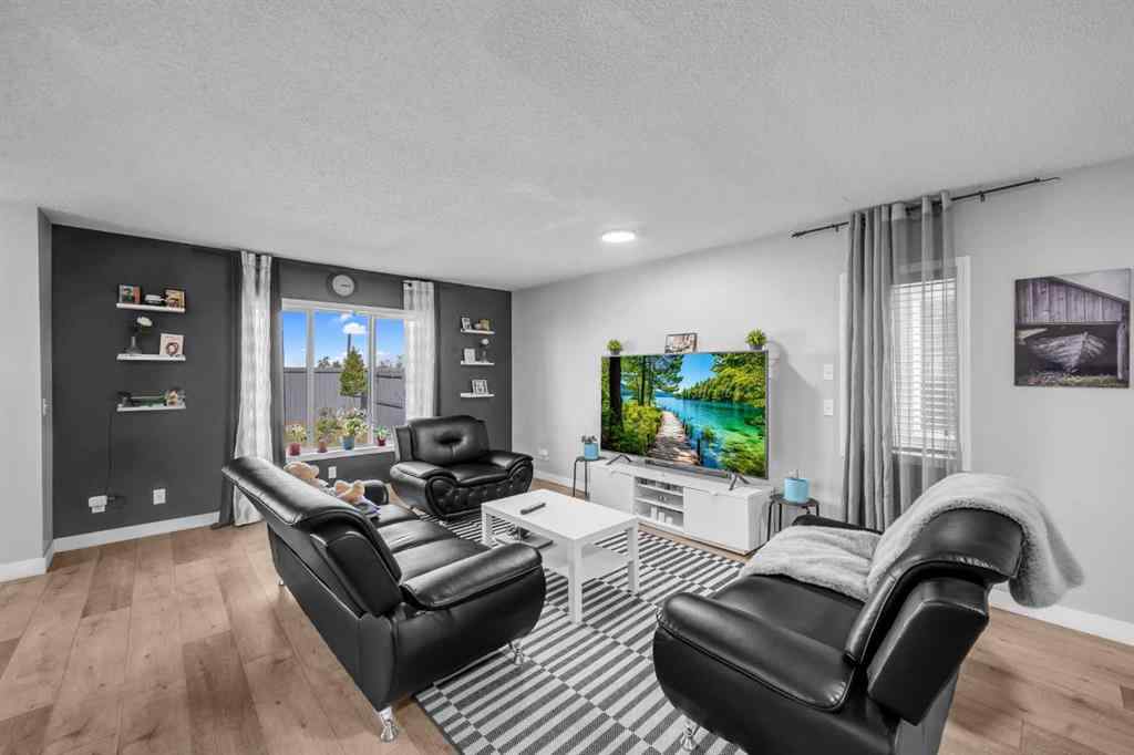 MLS® A2259387 - 233 Saddlecrest Way NE in Saddle Ridge Calgary, Residential