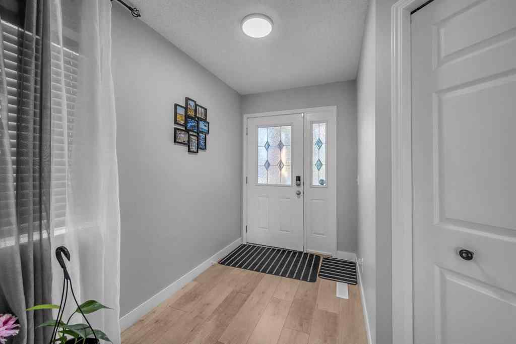 MLS® A2259387 - 233 Saddlecrest Way NE in Saddle Ridge Calgary, Residential