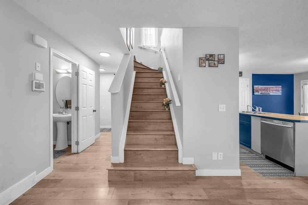 MLS® A2259387 - 233 Saddlecrest Way NE in Saddle Ridge Calgary, Residential