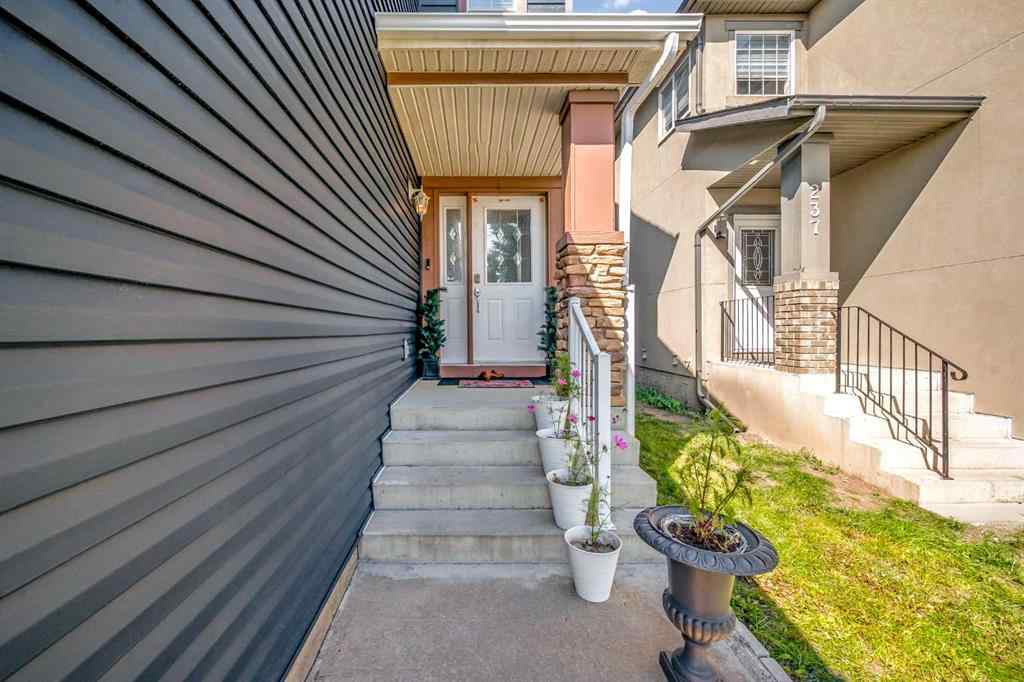 MLS® A2259387 - 233 Saddlecrest Way NE in Saddle Ridge Calgary, Residential
