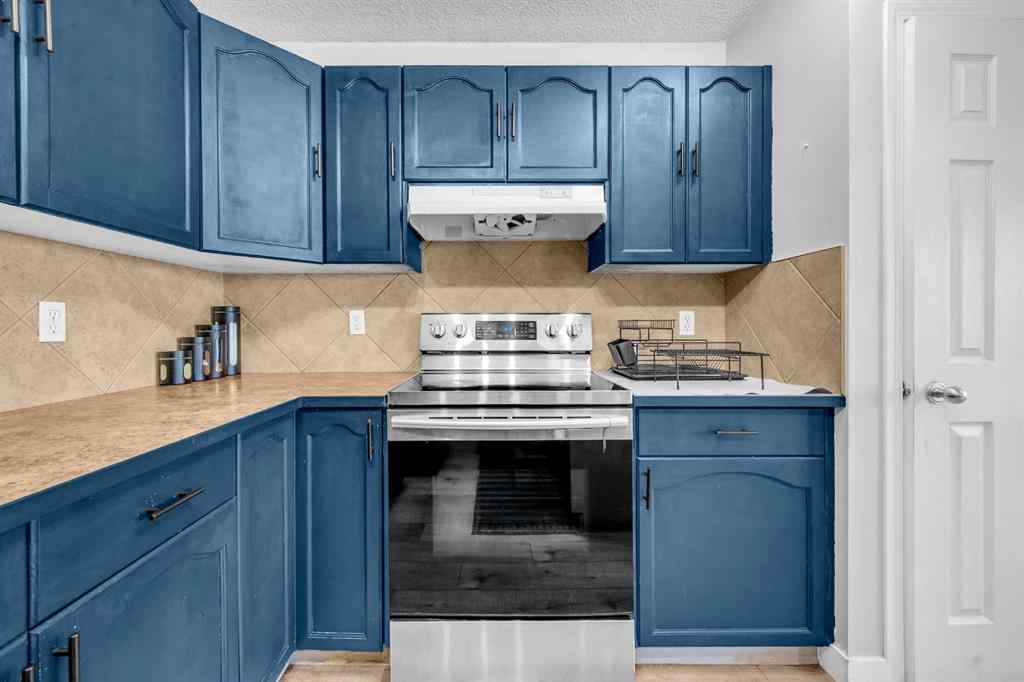 MLS® A2259387 - 233 Saddlecrest Way NE in Saddle Ridge Calgary, Residential