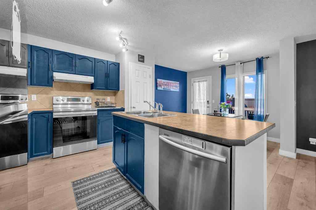 MLS® A2259387 - 233 Saddlecrest Way NE in Saddle Ridge Calgary, Residential
