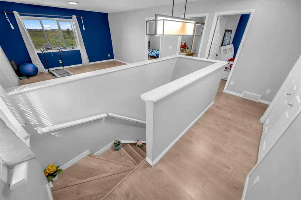 MLS® A2259387 - 233 Saddlecrest Way NE in Saddle Ridge Calgary, Residential