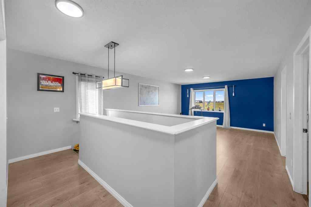 MLS® A2259387 - 233 Saddlecrest Way NE in Saddle Ridge Calgary, Residential