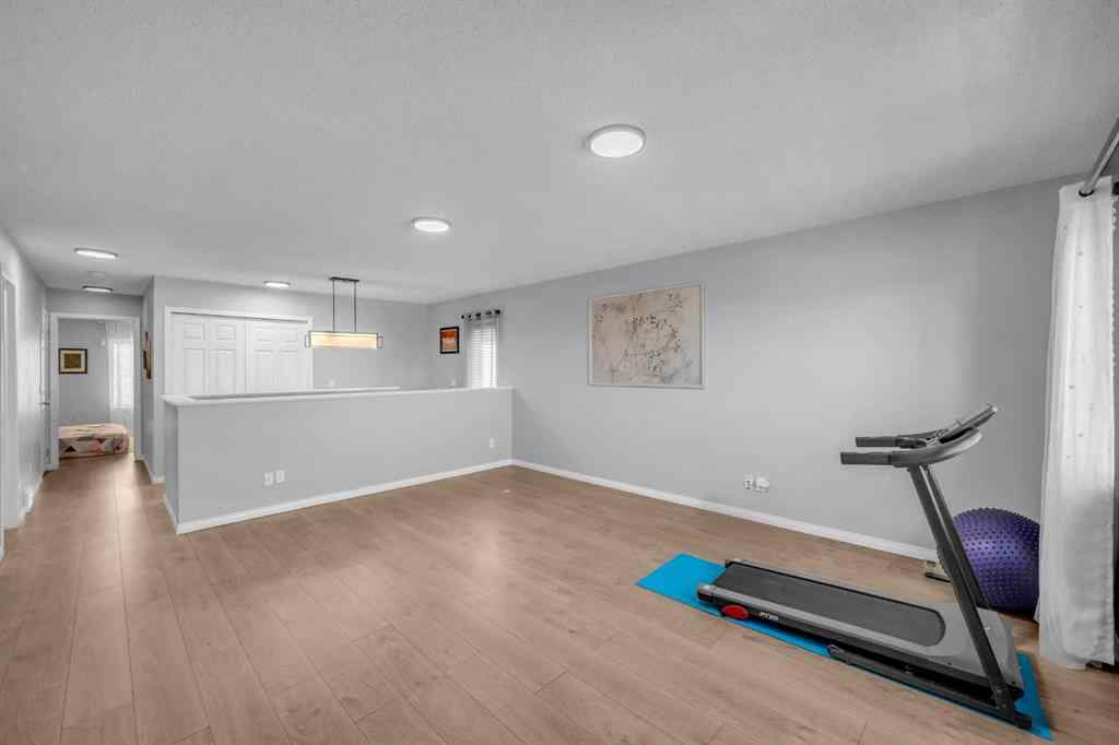 MLS® A2259387 - 233 Saddlecrest Way NE in Saddle Ridge Calgary, Residential
