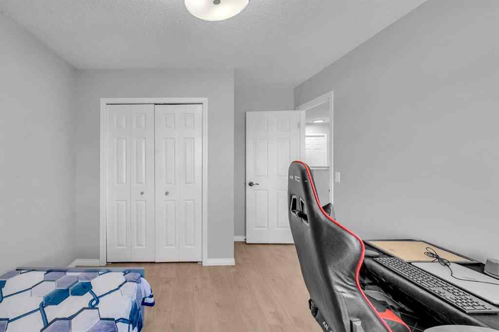 MLS® A2259387 - 233 Saddlecrest Way NE in Saddle Ridge Calgary, Residential