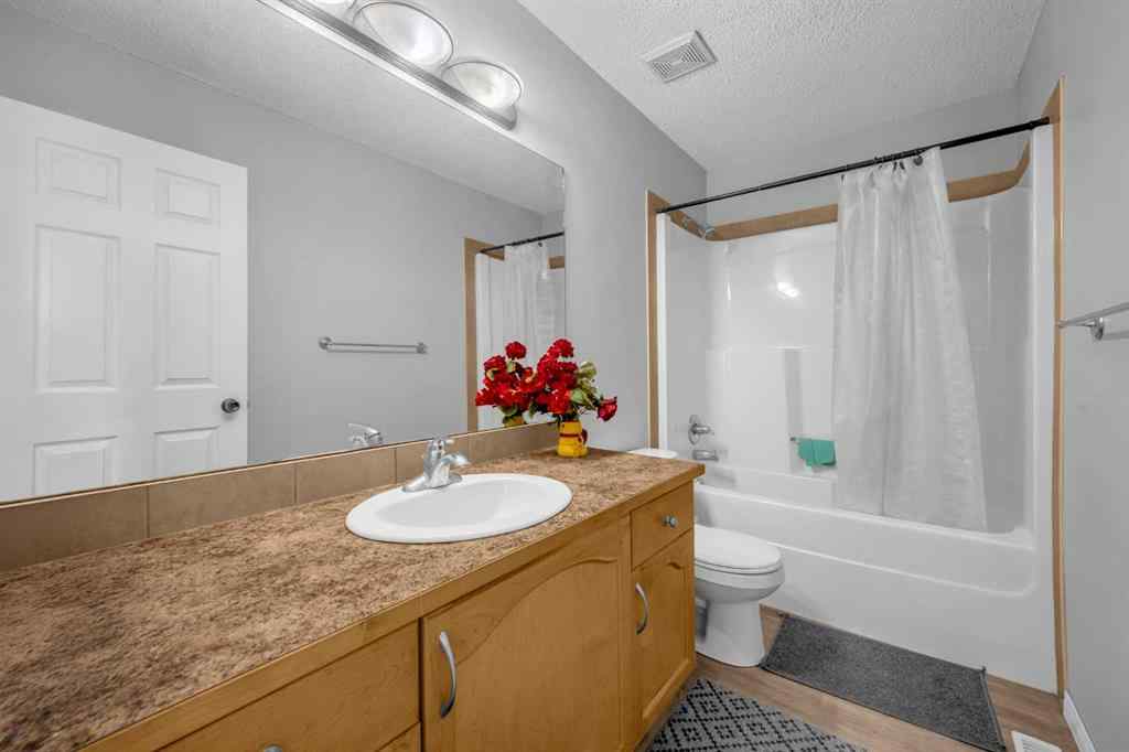 MLS® A2259387 - 233 Saddlecrest Way NE in Saddle Ridge Calgary, Residential