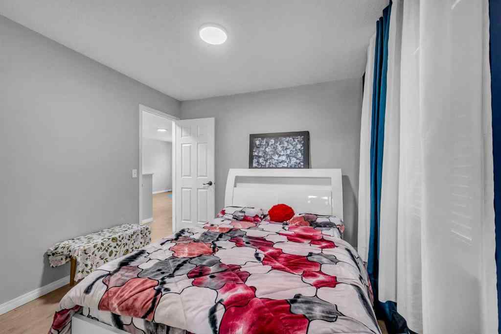 MLS® A2259387 - 233 Saddlecrest Way NE in Saddle Ridge Calgary, Residential